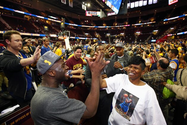 CLEVELAND, OH - JUNE 16:  Draymond Green #23 of the Golden State Warriors celebrates with his mother after the Golden State Warriors win Game Six of the 2015 NBA Finals at The Quicken Loans Arena on June 16, 2015 in Cleveland, Ohio. NOTE TO USER: User expressly acknowledges and agrees that, by downloading and/or using this Photograph, user is consenting to the terms and conditions of the Getty Images License Agreement. Mandatory Copyright Notice: Copyright 2015 NBAE (Photo by Nathaniel S. Butler/NBAE via Getty Images)