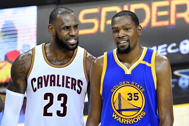 CLEVELAND, OH - JUNE 09: LeBron James #23 of the Cleveland Cavaliers and Kevin Durant #35 of the Golden State Warriors speak after a foul in the third quarter in Game 4 of the 2017 NBA Finals at Quicken Loans Arena on June 9, 2017 in Cleveland, Ohio. NOTE TO USER: User expressly acknowledges and agrees that, by downloading and or using this photograph, User is consenting to the terms and conditions of the Getty Images License Agreement. (Photo by Jason Miller/Getty Images) CLEVELAND, OH - JUNE 09: LeBron James #23 of the Cleveland Cavaliers and Kevin Durant #35 of the Golden State Warriors speak after a foul in the third quarter in Game 4 of the 2017 NBA Finals at Quicken Loans Arena on June 9, 2017 in Cleveland, Ohio. NOTE TO USER: User expressly acknowledges and agrees that, by downloading and or using this photograph, User is consenting to the terms and conditions of the Getty Images License Agreement. (Photo by Jason Miller/Getty Images)