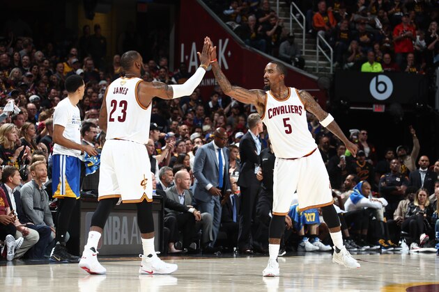 CLEVELAND, OH - JUNE 7:  JR Smith #5 of the Cleveland Cavaliers high fives LeBron James #23 during the game against the Golden State Warriors in Game Three of the 2017 NBA Finals on June 7, 2017 at Quicken Loans Arena in Cleveland, Ohio. NOTE TO USER: User expressly acknowledges and agrees that, by downloading and or using this photograph, user is consenting to the terms and conditions of Getty Images License Agreement. Mandatory Copyright Notice: Copyright 2017 NBAE (Photo by Nathaniel S. Butler/NBAE via Getty Images)