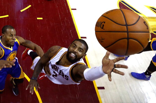 CLEVELAND, OH - JUNE 09: Kyrie Irving #2 of the Cleveland Cavaliers shoots in the first half against Andre Iguodala #9 of the Golden State Warriors in Game 4 of the 2017 NBA Finals at Quicken Loans Arena on June 9, 2017 in Cleveland, Ohio. NOTE TO USER: User expressly acknowledges and agrees that, by downloading and or using this photograph, User is consenting to the terms and conditions of the Getty Images License Agreement.  (Photo by Larry W. Smith - Pool/Getty Images)