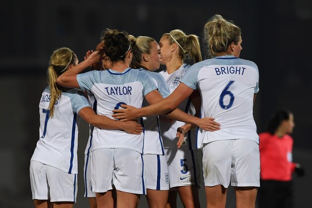 BURSLEM, ENGLAND - APRIL 07:  Jodie Taylor #9 of England is congratulated by teammates after scoring the opening goal during the Women's International friendly match between England and Italy at Vale Park on April 7, 2017 in Burslem, England.  (Photo by Gareth Copley/Getty Images,)