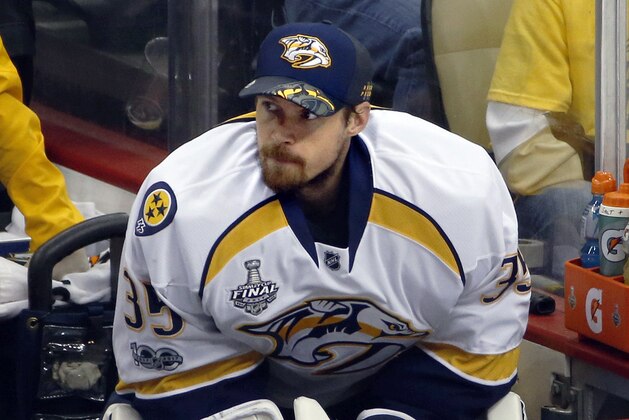 Nashville Predators goalie Pekka Rinne watches from the bench during the second period in Game 5 of the team's NHL hockey Stanley Cup Final against the Pittsburgh Penguins, Thursday, June 8, 2017, in Pittsburgh. (AP Photo/Gene J. Puskar)