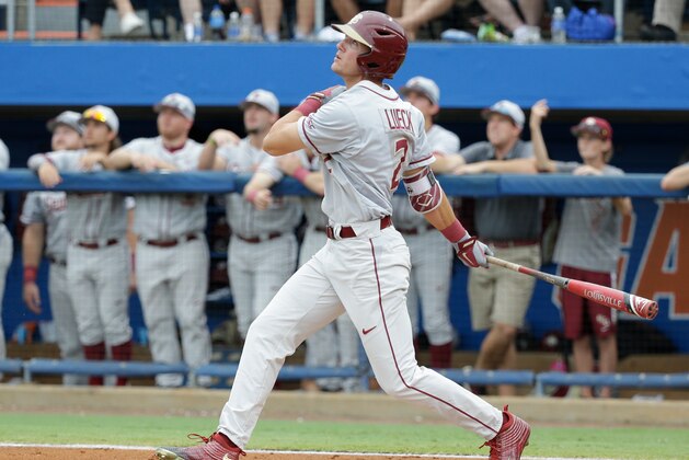 Florida State's Jackson Lueck bats against Florida in an NCAA college baseball tournament super regional game, Saturday, June 11, 2016, in Gainesville, Fla. (AP Photo/John Raoux)