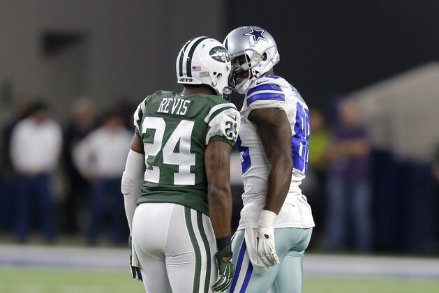 New York Jets' Darrelle Revis (24) and Dallas Cowboys' Dez Bryant (88) face off as they line up against each other in the first half of an NFL football game, Saturday, Dec. 19, 2015, in Arlington, Texas. (AP Photo/Brandon Wade)