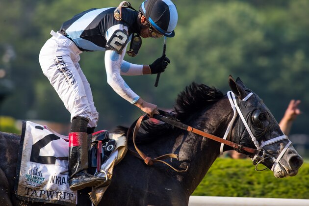 ELMONT, NY - JUNE 10: Jose Ortiz, aboard Tapwrit #2, smiles after winning the 149th Belmont Stakes on Belmont Stakes Day at Belmont Park on June 10, 2017 in Elmont, New York (Photo by Jesse Caris/Eclipse Sportswire/Getty Images)