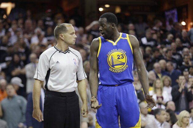 Golden State Warriors forward Draymond Green (23) questions referee John Goble (30) about a foul against the Cleveland Cavaliers in the first half of Game 4 of basketball's NBA Finals in Cleveland, Friday, June 9, 2017. (AP Photo/Tony Dejak)