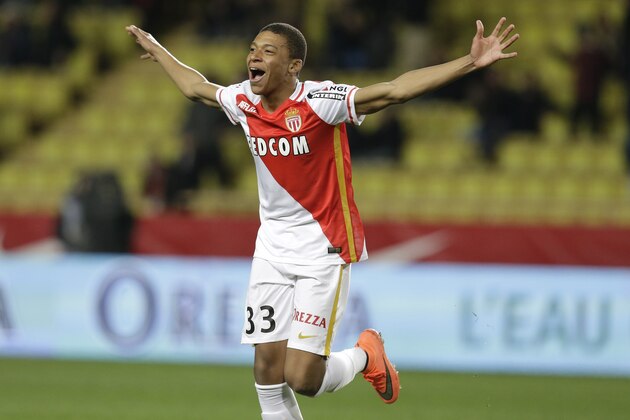 FILE - In this Saturday, Feb. 20, 2016 file photo, Monaco's Kylian Mbappe Lottin celebrates scoring the third goal against Troyes during their French League One soccer match, in Monaco.  Les Monegasques will need top scorer Radamel Falcao and teen star Kylian Mbappe at their brilliant best to topple Manchester City in their return leg Champions League match. (AP Photo/Lionel Cironneau, File)