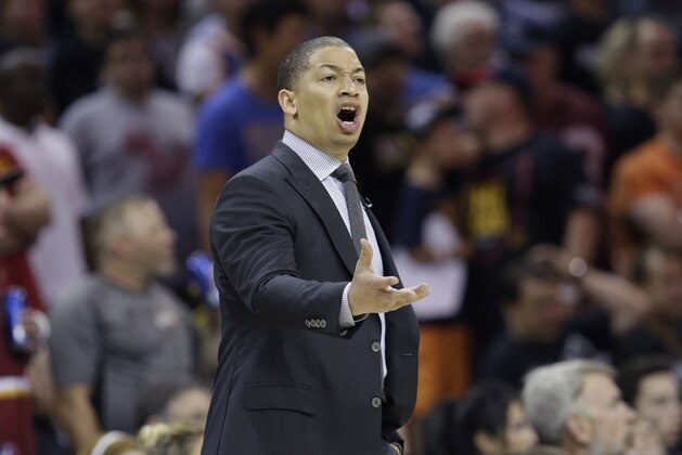 Cleveland Cavaliers head coach Tyronn Lue gives instructions during the first half against the Cleveland Cavaliers in Game 4 of basketball's NBA Finals in Cleveland, Friday, June 9, 2017. (AP Photo/Tony Dejak)