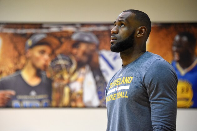 OAKLAND, CA - JUNE 11:  LeBron James #23 of the Cleveland Cavaliers looks on during practice and media availability as part of the 2017 NBA Finals on June 11, 2017 at Warriors Practice Facility in Oakland, California. NOTE TO USER: User expressly acknowledges and agrees that, by downloading and or using this photograph, User is consenting to the terms and conditions of the Getty Images License Agreement. Mandatory Copyright Notice: Copyright 2017 NBAE (Photo by Andrew D. Bernstein/NBAE via Getty Images)