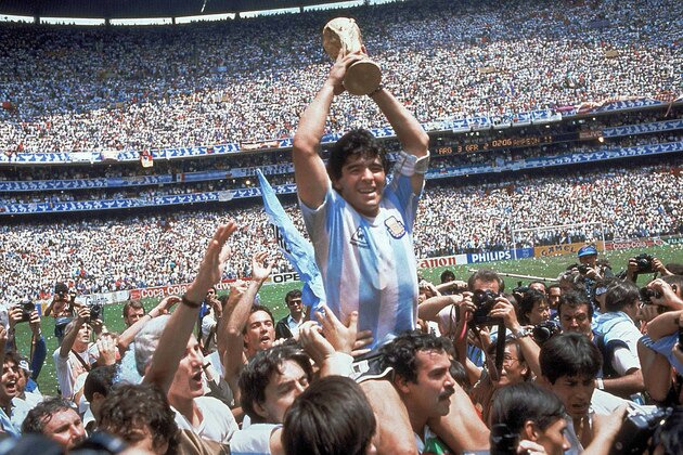 FILE - This is a June 29, 1986  file photo  of  Diego Maradona of Argentina celebrates with the cup at the end of the World Cup soccer final in the Atzeca Stadium, in Mexico City, Mexico. Argentina defeated West Germany 3-2 to take the trophy.   With one week to go before the World Cup starts in Brazil, The Associated Press takes a look at 10 great stars in the tournament's history. Maradona One the greatest playmakers of all time, Maradona was joint FIFA Player of the 20th Century with Pele. “El Pibe de Oro” inspired Argentina to victory in the 1986 tournament. The English will never forgive him for his “Hand of God” goal en route to winning the World Cup. And perhaps his own people, the Argentines, will never forgive him for being a terrible coach for the national team at the World Cup four years ago in South Africa. But as player, Maradona was peerless during his heyday, although drug problems marred the end of his career. (AP Photo/Carlo Fumagalli, File)