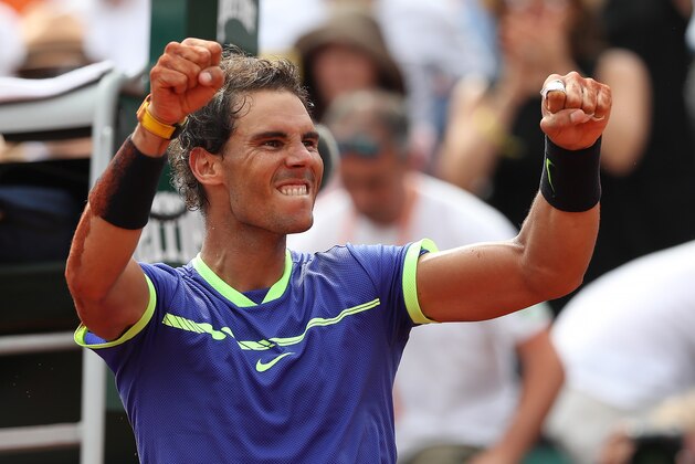 PARIS, FRANCE - JUNE 11:  Rafael Nadal of Spain celebrates victory during his match against Stan Wawrinka of Switzerland during the Men's Singles Final, on day fifthteen at Roland Garros on June 11, 2017 in Paris, France. (Photo by Ian MacNicol/Getty Images)