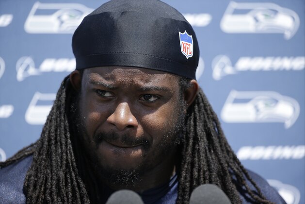 Seattle Seahawks running back Eddie Lacy talks to reporters following NFL football practice, Friday, June 2, 2017, in Renton, Wash. (AP Photo/Ted S. Warren)
