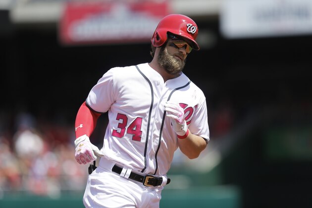 Washington Nationals' Bryce Harper rounds third base after hitting a home run in the first inning of the first game of a doubleheader against the Philadelphia Phillies, Sunday, May 14, 2017, in Washington. (AP Photo/Mark Tenally)
