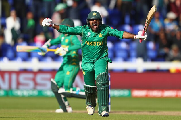 CARDIFF, WALES - JUNE 12:  Sarfraz Ahmed (R) of Pakistan celebrates with Mohammad Amir (L) after hitting the winning runs and victory by 3 wickets during the ICC Champions Trophy match between Sri Lanka and Pakistan at the SWALEC Stadium on June 12, 2017 in Cardiff, Wales.  (Photo by Michael Steele/Getty Images)