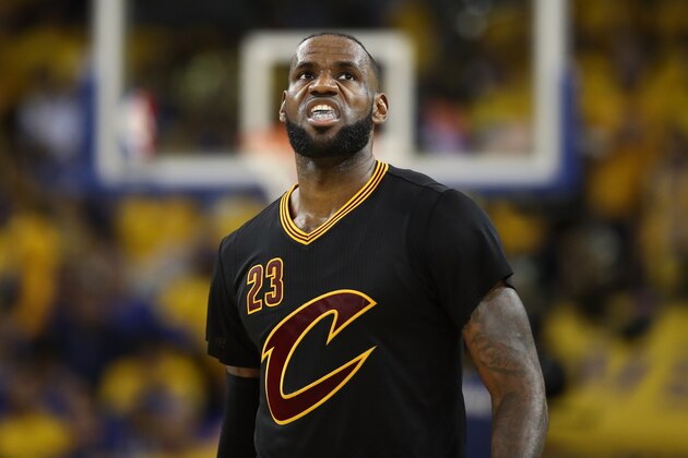 OAKLAND, CA - JUNE 12:  LeBron James #23 of the Cleveland Cavaliers reacts against the Golden State Warriors in Game 5 of the 2017 NBA Finals at ORACLE Arena on June 12, 2017 in Oakland, California. NOTE TO USER: User expressly acknowledges and agrees that, by downloading and or using this photograph, User is consenting to the terms and conditions of the Getty Images License Agreement.  (Photo by Ezra Shaw/Getty Images)