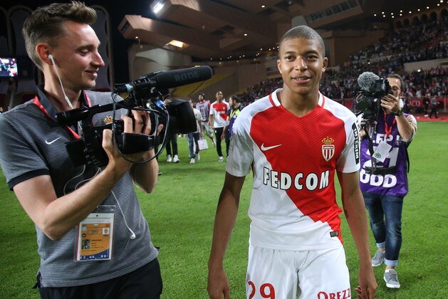 MONACO, MONACO - MAY 17: Kylian Mbappe of Monaco during the French League 1 Championship title celebration following the French Ligue 1 match between AS Monaco and AS Saint-Etienne (ASSE) at Stade Louis II on May 17, 2017 in Monaco, Monaco. (Photo by Jean Catuffe/Getty Images) MONACO, MONACO - MAY 17: Kylian Mbappe of Monaco during the French League 1 Championship title celebration following the French Ligue 1 match between AS Monaco and AS Saint-Etienne (ASSE) at Stade Louis II on May 17, 2017 in Monaco, Monaco. (Photo by Jean Catuffe/Getty Images)