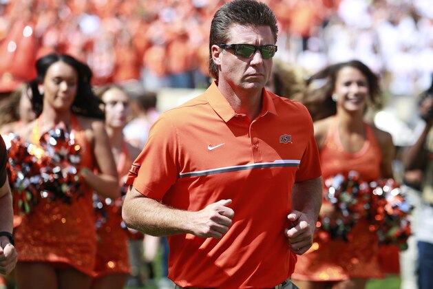 STILLWATER, OK - SEPTEMBER 17 :  Head Coach Mike Gundy of the Oklahoma State Cowboys takes the field before the game against the Pittsburgh Panthers September 17, 2016 at Boone Pickens Stadium in Stillwater, Oklahoma. Oklahoma State defeated Pitt 45-38. (Photo by Brett Deering/Getty Images)