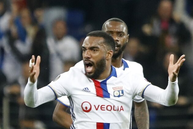 Lyon's Alexandre Lacazette celebrates scoring during the second leg semi final soccer match between Olympique Lyon and Ajax in the Stade de Lyon, Decines, France, Thursday, May 11, 2017. (AP Photo/Laurent Cipriani)