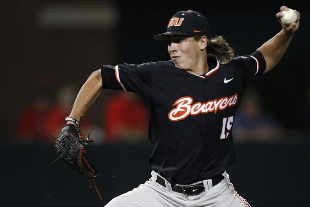Oregon State's Luke Heimlich pitches to a Dallas Baptist batter during the third inning of an NCAA college baseball tournament regional game Sunday, May 31, 2015, in Dallas. (AP Photo/Ralph Lauer)