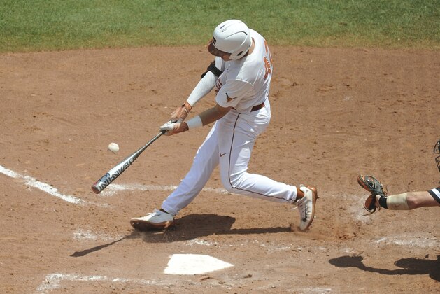 Texas' Kacy Clemens connects with the ball in the championship game in the Big 12 baseball tournament in Oklahoma City, Sunday, May 28, 2017. (AP Photo/Kyle Phillips)