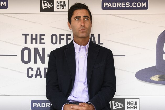 SAN DIEGO, CA - APRIL 7: AJ Preller of the San Diego Padres sits in the dugout prior to the game on Opening Day against the San Francisco Giants at Petco Park on April 7, 2017 in San Diego, California. (Photo by Andy Hayt/San Diego Padres/Getty Images)