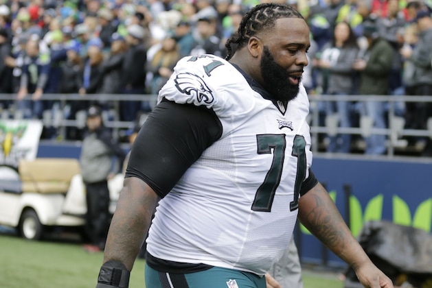 Philadelphia Eagles tackle Jason Peters walks toward the locker room after receiving oxygen on the sideline during an NFL football game against the Seattle Seahawks, Sunday, Nov. 20, 2016, in Seattle. (AP Photo/Stephen Brashear)