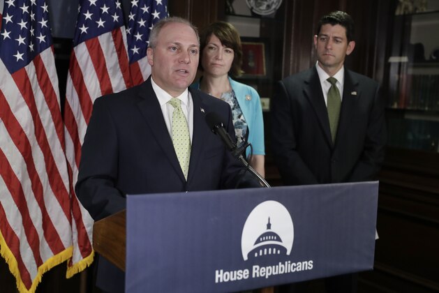 In a photo from Tuesday, June 13, 2017, House Majority Whip Steve Scalise, R-La., joined by Speaker of the House Paul Ryan, R-Wis., far right, and Rep. Cathy McMorris Rodgers, R-Wash., comments on health care for veterans during a news conference at Republican National Committee Headquarters on Capitol Hill in Washington. (AP Photo/J. Scott Applewhite)