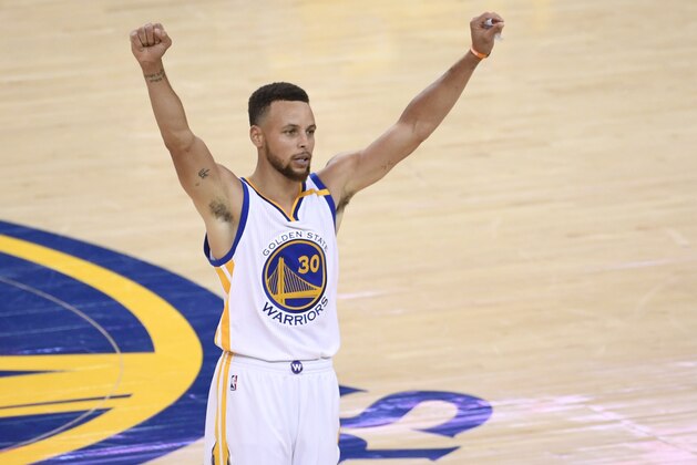 Jun 12, 2017; Oakland, CA, USA; Golden State Warriors guard Stephen Curry (30) celebrates after defeating the Cleveland Cavaliers in game five of the 2017 NBA Finals at Oracle Arena. Mandatory Credit: Kyle Terada-USA TODAY Sports