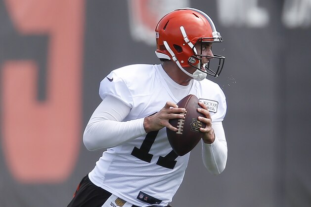 Cleveland Browns' Brock Osweiler rolls out during NFL football practice at the team's training facility Tuesday, June 13, 2017, in Berea, Ohio. (AP Photo/Ron Schwane)