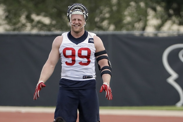 Houston Texans defensive end J.J. Watt (99) stretches during an NFL organized team activities football practice Tuesday, June 6, 2017, in Houston. (AP Photo/David J. Phillip)