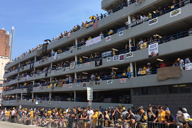 Pittsburgh Penguins fans waits for the start of the Penguins' NHL hockey Stanley Cup victory parade in Pittsburgh, Wednesday, June 14, 2017. (AP Photo/Gene J. Puskar)