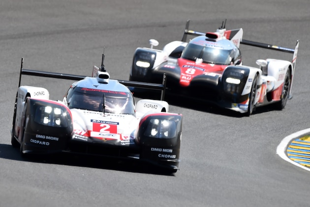 New Zealand driver Earl Bamber drives his Porsche 919 Hybrid N°2 ahead of Swiss driver Sébastien Buemi on his Toyota TS050 Hybrid N°8 during a free practice session of the Le Mans 24 hours endurance race in Le Mans north-western France on June 14, 2017.

Sixty cars with 180 drivers will participate on June 17 and 18 June at the 85rd 'Le Mans 24-hours' endurance race.  / AFP PHOTO / JEAN-FRANCOIS MONIER        (Photo credit should read JEAN-FRANCOIS MONIER/AFP/Getty Images)