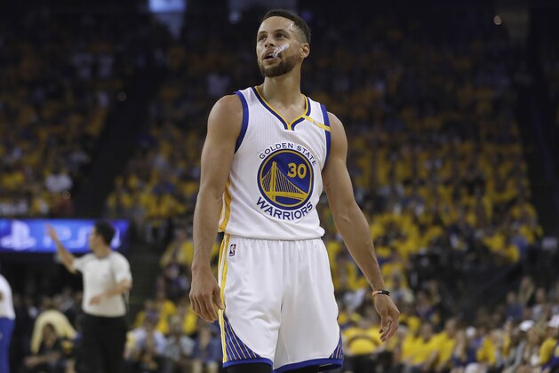 Golden State Warriors guard Stephen Curry (30) against the Cleveland Cavaliers during the first half of Game 1 of basketball's NBA Finals in Oakland, Calif., Thursday, June 1, 2017. (AP Photo/Marcio Jose Sanchez)