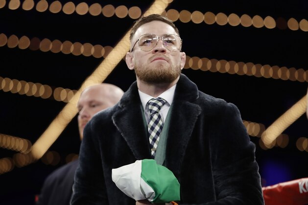 Conor McGregor, of Ireland, stands in the ring before a super bantamweight boxing match between Michael Conlan, of Ireland, and Tim Ibarra on Friday, March 17, 2017, in New York. Conlan stopped Ibarra in the third round. (AP Photo/Frank Franklin II)