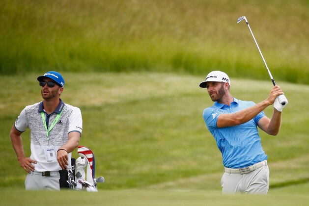 HARTFORD, WI - JUNE 14:  Dustin Johnson of the United States plays his shot during a practice round prior to the 2017 U.S. Open at Erin Hills on June 14, 2017 in Hartford, Wisconsin.  (Photo by Gregory Shamus/Getty Images)