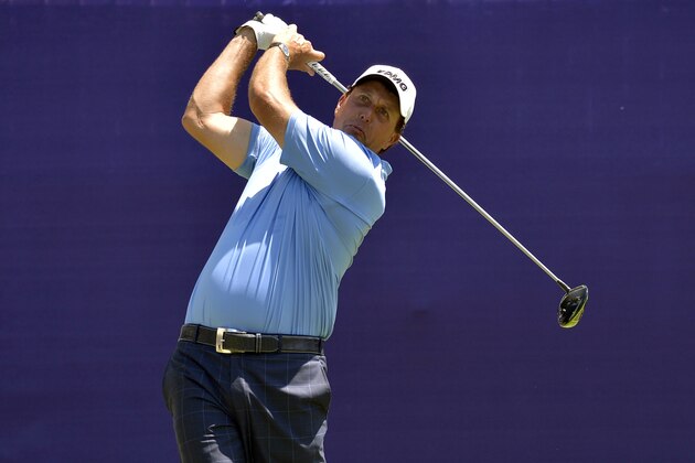 Phil Mickelson tees off on the first hole during the final round of the St. Jude Classic golf tournament Sunday, June 11, 2017, in Memphis, Tenn. (AP Photo/Brandon Dill)