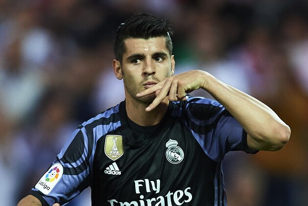 GRANADA, SPAIN - MAY 06:  Alvaro Morata of Real Madrid CF celebrates after scoring the second goal during the La Liga match between Granada CF v Real Madrid CF at Estadio Nuevo Los Carmenes on May 6, 2017 in Granada, Spain.  (Photo by Aitor Alcalde/Getty Images)