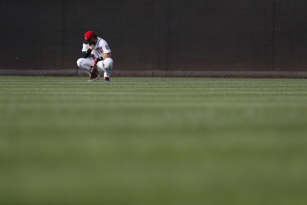 Washington Nationals right fielder Bryce Harper (34) waits in the outfield during a pitching change in the the seventh inning of a baseball game against the Atlanta Braves at Nationals Park, Wednesday, June 14, 2017, in Washington. The Braves won 13-2. (AP Photo/Carolyn Kaster)