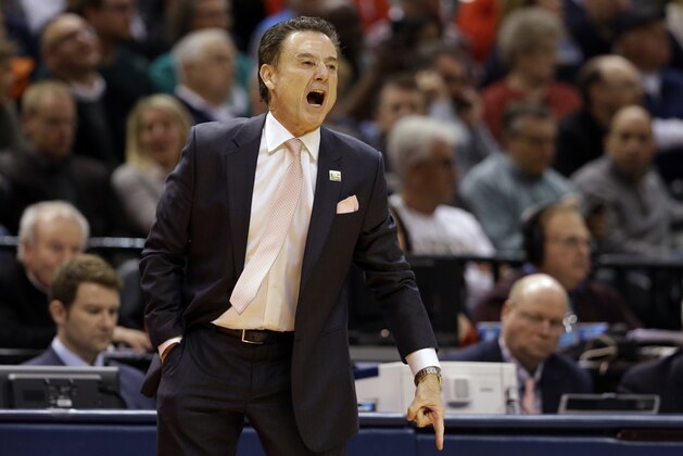 Louisville head coach Rick Pitino yells to his team from the sideline during the first half of a first-round game against Jacksonville State in the men's NCAA college basketball tournament in Indianapolis, Friday, March 17, 2017. (AP Photo/Michael Conroy)