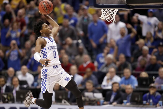 Kentucky's De'Aaron Fox heads to the basket during the second half of a second-round game against Wichita State in the men's NCAA college basketball tournament Sunday, March 19, 2017, in Indianapolis. Kentucky won 65-62. (AP Photo/Jeff Roberson)