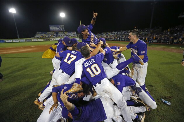LSU celebrates after defeating Mississippi State in an NCAA college baseball tournament super regional game in Baton Rouge, La., Monday, June 12, 2017. LSU won 14-4 to advance to the College World Series. (AP Photo/Gerald Herbert)
