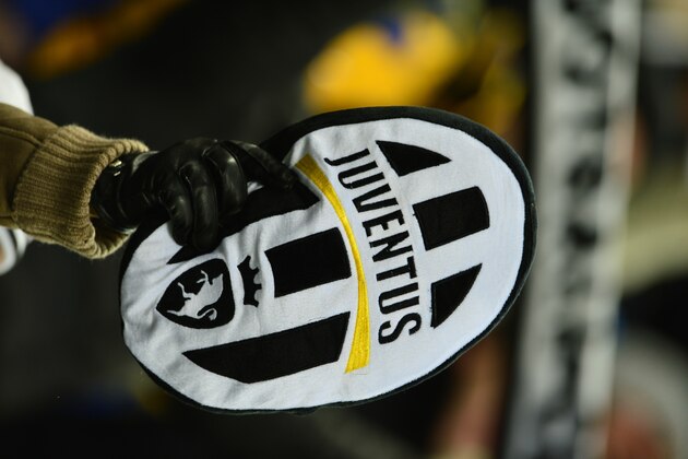 A Juventus supporter waves their logo during the Italian Serie A football match between Juventus and Fiorentina at the Juventus Stadium in Turin on February 9, 2013. AFP PHOTO / GIUSEPPE CACACE        (Photo credit should read GIUSEPPE CACACE/AFP/Getty Images)