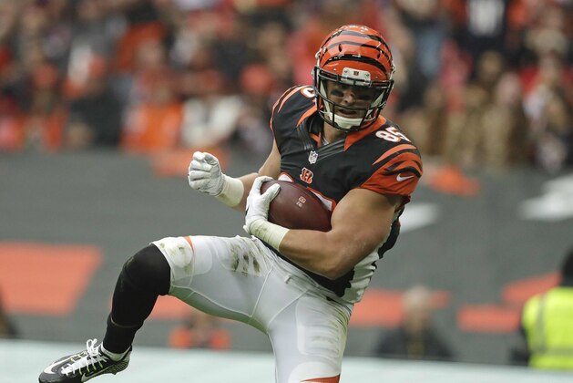 FILE - In this Oct. 30, 2016, file photo, Cincinnati Bengals tight end Tyler Eifert (85) catches the ball to score a touchdown during an NFL Football game against Washington Redskins at Wembley Stadium in London. The Bengals have a losing record even though they’ve been one of the most fortunate teams in the league with injuries. They’re basically at full strength now that tight end Tyler Eifert has returned from ankle surgery. (AP Photo/Matt Dunham, File)
