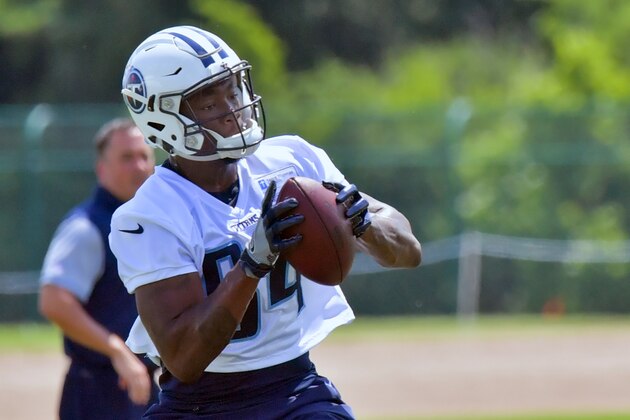 Jun 13, 2017; Nashville, TN, USA; Tennessee Titans wide receiver Corey Davis (84) catches a pass during OTA at St Thomas Sports Park Mandatory Credit: Jim Brown-USA TODAY Sports Jun 13, 2017; Nashville, TN, USA; Tennessee Titans wide receiver Corey Davis (84) catches a pass during OTA at St Thomas Sports Park Mandatory Credit: Jim Brown-USA TODAY Sports