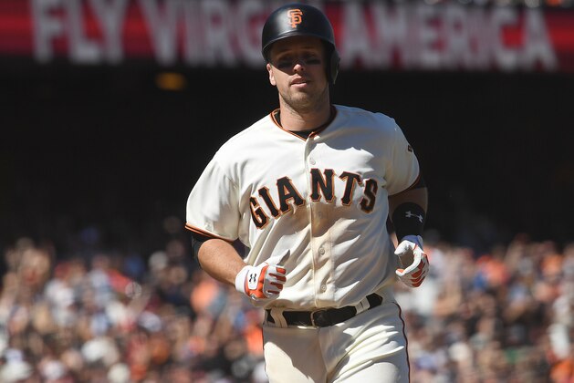 SAN FRANCISCO, CA - JUNE 11:  Buster Posey #28 of the San Francisco Giants scores against the Minnesota Twins in the bottom of the seventh inning at AT&T Park on June 11, 2017 in San Francisco, California.  (Photo by Thearon W. Henderson/Getty Images)