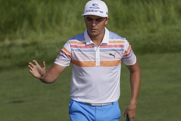 Rickie Fowler reacts after his birdie on the12th hole during the first round of the U.S. Open golf tournament Thursday, June 15, 2017, at Erin Hills in Erin, Wis. (AP Photo/David J. Phillip)