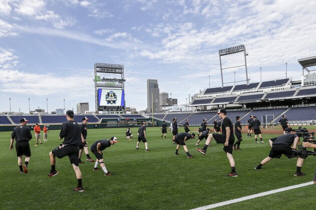 Oregon State players warm up at the start of team practice in Omaha, Neb., Friday, June 16, 2017. Oregon State is on the cusp of joining the company of the greatest college baseball teams of all time. At 54-4, the Beavers enter the College World Series with the fewest losses of any team since 1982. (AP Photo/Nati Harnik)