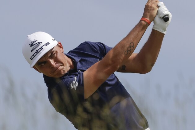 Rickie Fowler hits a drive on the seventh hole during the second round of the U.S. Open golf tournament Friday, June 16, 2017, at Erin Hills in Erin, Wis. (AP Photo/Chris Carlson)