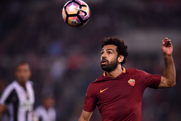 Roma's midfielder from Egypt Mohamed Salah eyes the ball during the Italian Serie A football match Roma vs Juventus, on May 14, 2017 at Rome's Olympic stadium. / AFP PHOTO / FILIPPO MONTEFORTE        (Photo credit should read FILIPPO MONTEFORTE/AFP/Getty Images)