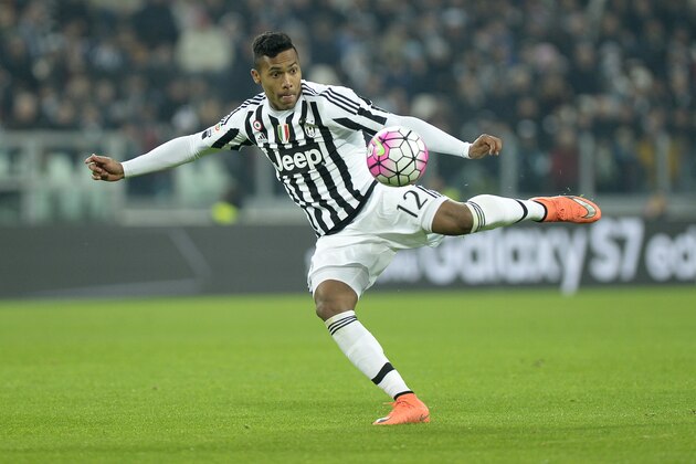 Juventus' Alex Sandro kicks the ball during a Serie A soccer match between Juventus and Sassuolo at the Juventus stadium, in Turin, Italy, Friday, March 11, 2016. (AP Photo/Massimo Pinca)